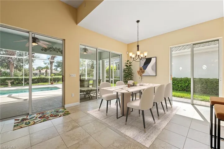 28847 Yellow Fin Tri, Bonita Springs FL 34135 - Dining area surrounded by sliders