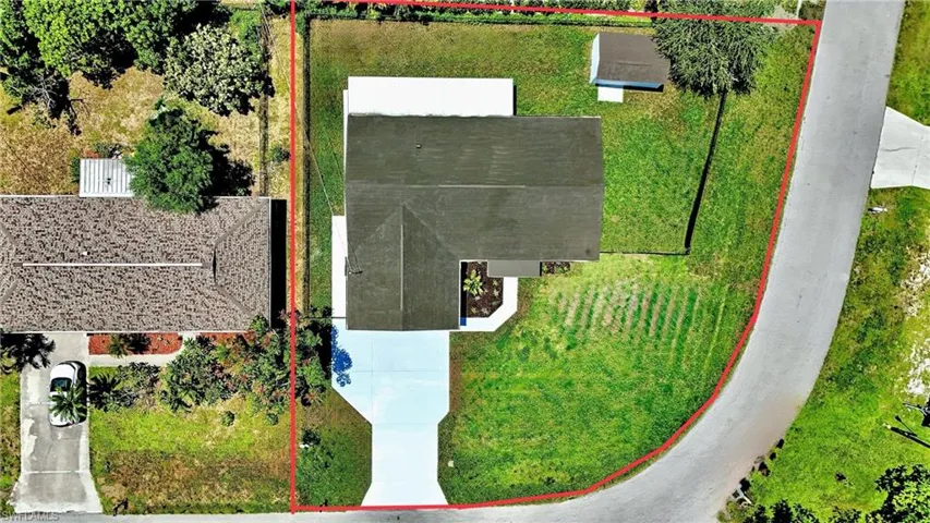 Aerial overview of property's location featuring property parcel outlined