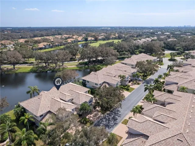 Aerial view of residential area with a large body of water