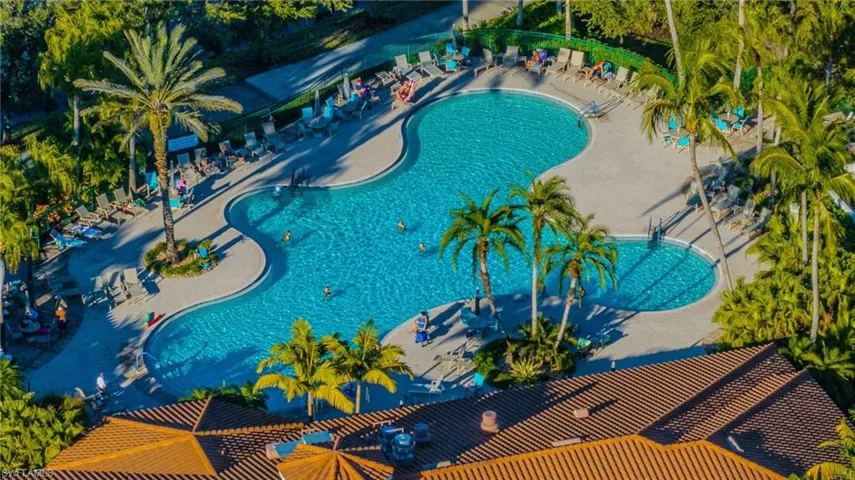 Community pool featuring a patio area
