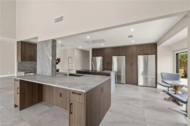 Three Refrigerators/Freezer