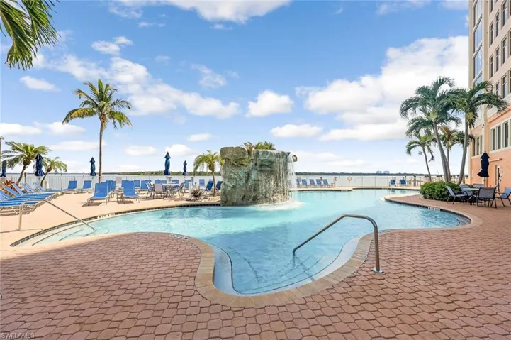 Community pool featuring a patio area