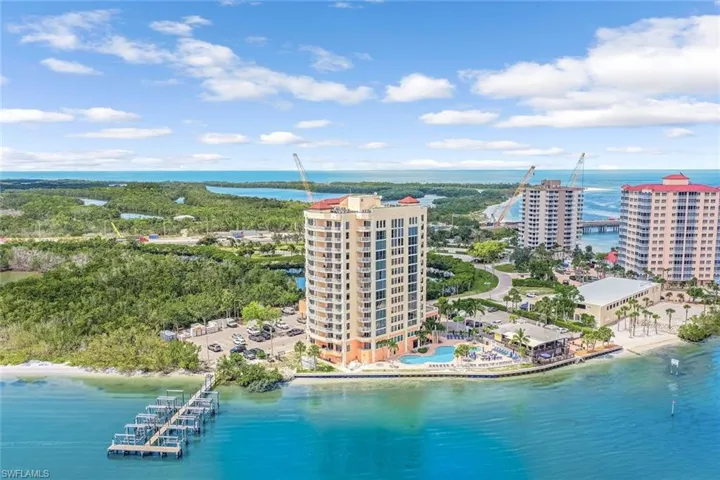 Bird's eye view of a nearby body of water and apartment complex