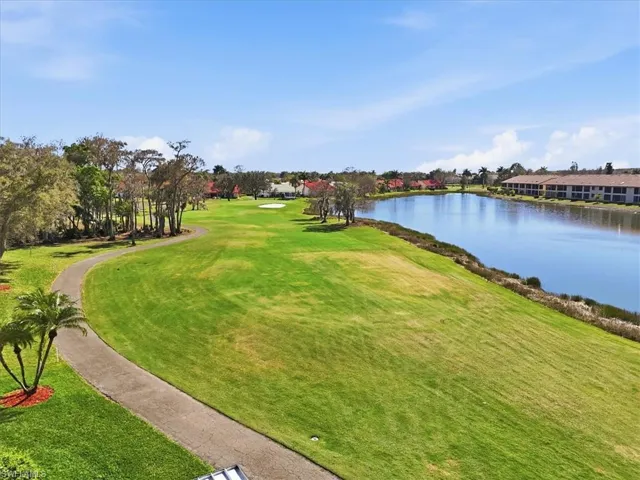 View of community featuring a water view and golf course view