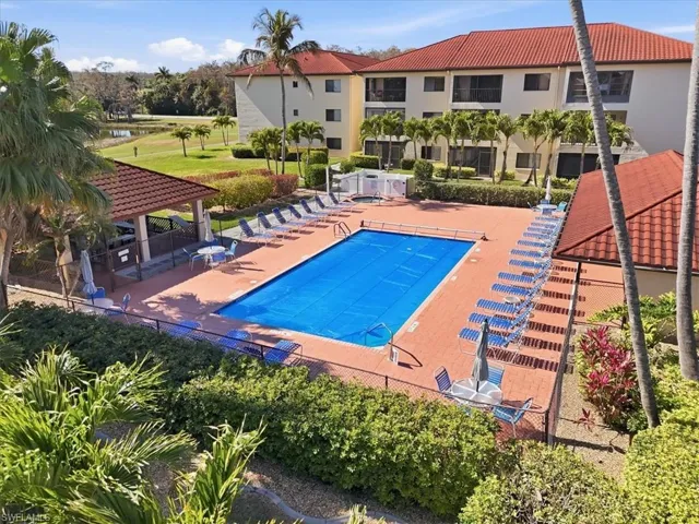 Community pool featuring a patio area