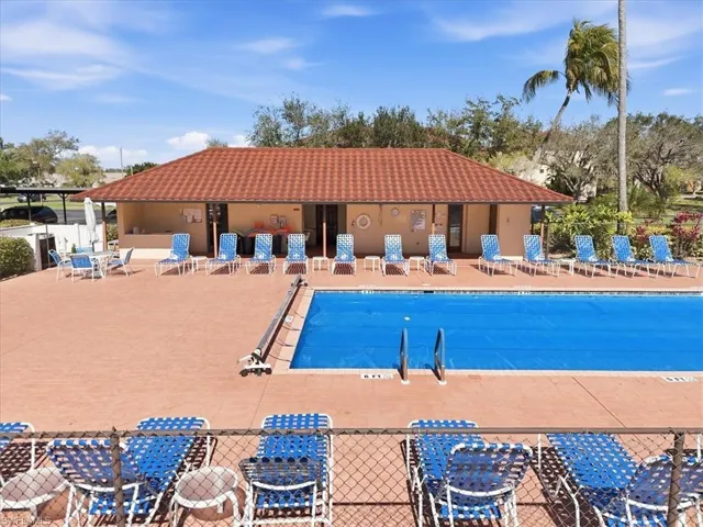 Community pool featuring a patio area