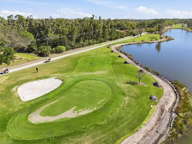 Aerial view of a local golf course and a large body of water