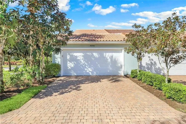 View of the Garage & Paver Driveway with Plenty of Parking!