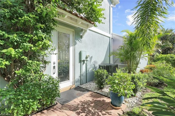 Side Enterance with Paver Walkway