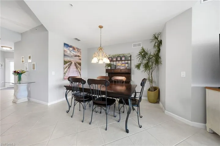 Dining area open to kitchen and living room, ideal for entertaining