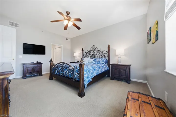 Primary bedroom with lake views and generous layoutgenerous layout