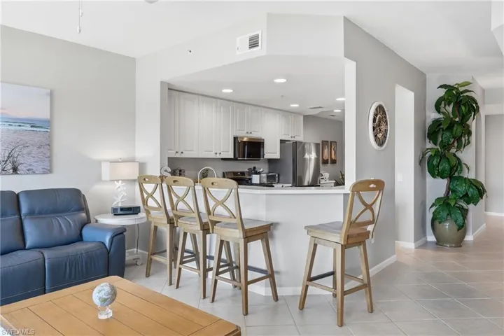 Breakfast bar seating overlooking living space