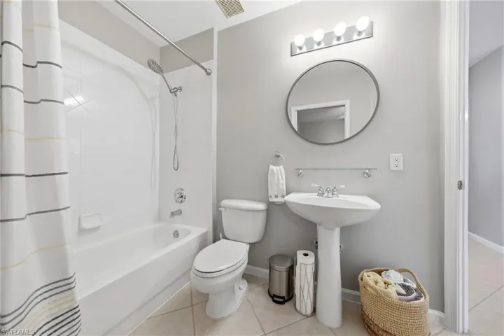 Guest bathroom with tub/shower combination