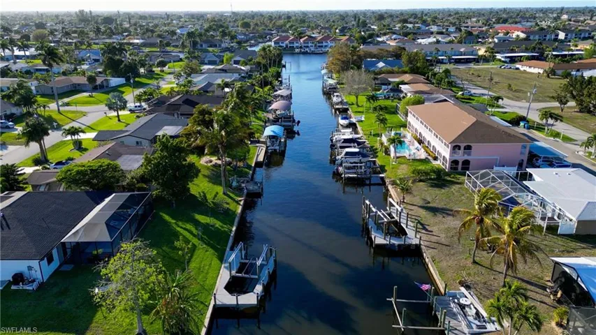 Aerial view of residential area with a large body of water