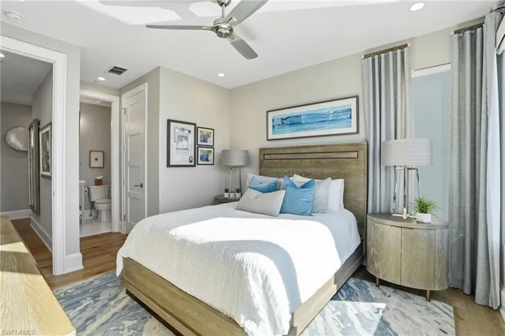 Ensuite bathroom, walk-in closet, water view, motorized window treatments.