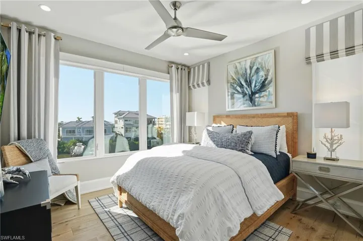Ensuite bathroom, closet, water view, oak hardwood floor.
