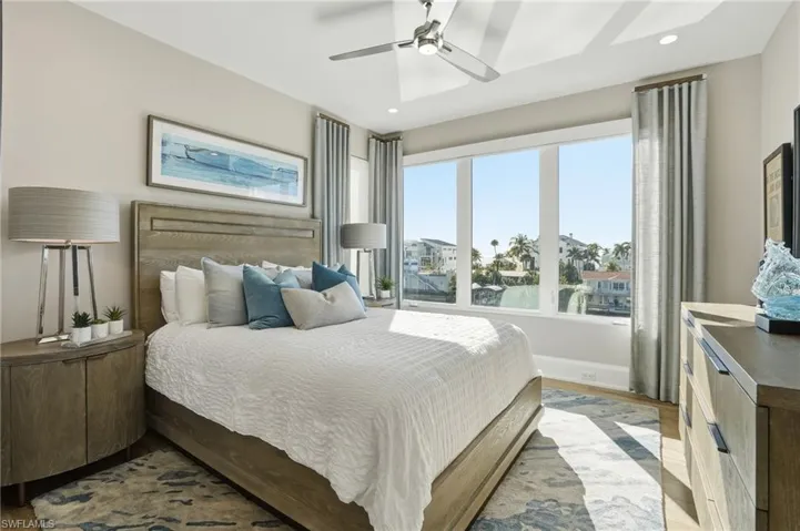 Ensuite bathroom, walk-in closet, water view.
