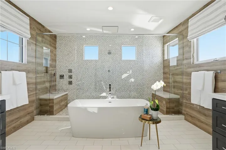 Ensuite, oversized shower, dual vanities, soaking tub, private water closet.