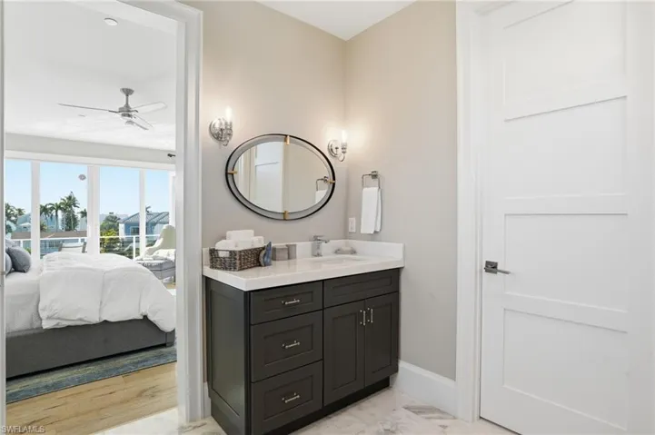 2nd primary ensuite, dual vanities, designer tile and finishes, oversized walk-in closet.