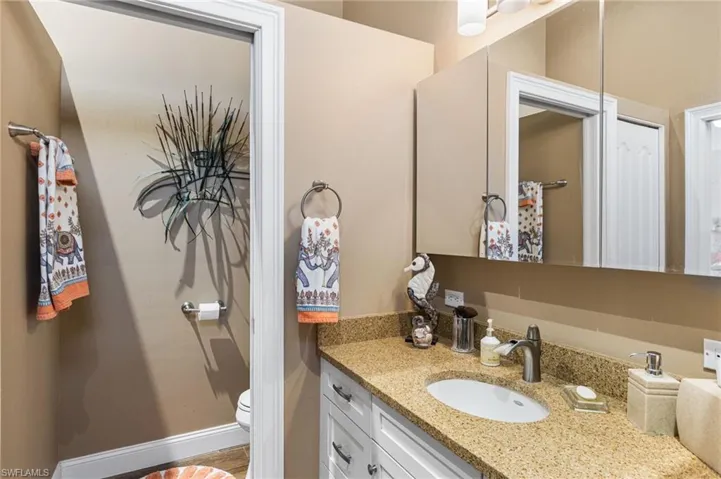 Bathroom with toilet and vanity