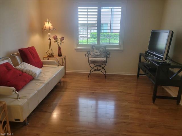 Den with window, closet and pocket doors for privacy.  Great for office or 3rd bedroom