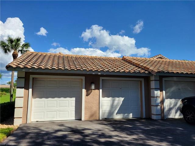 Front of garage with electric door opener.