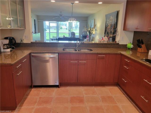 Open and airy kitchen with recessed lighting