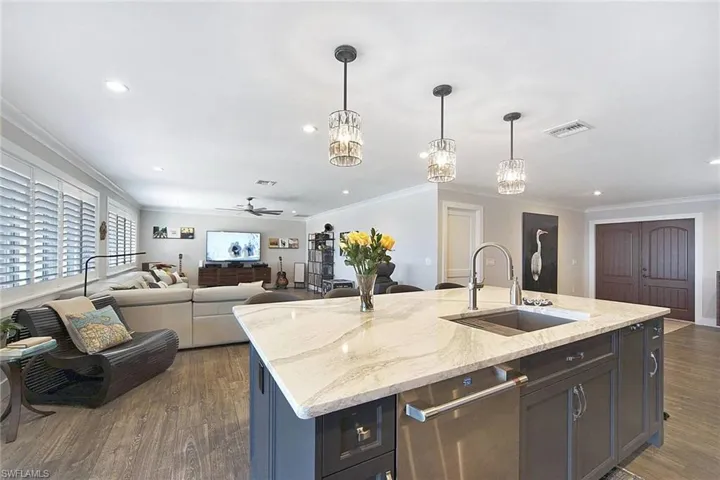 View to great room & foyer from kitchen island