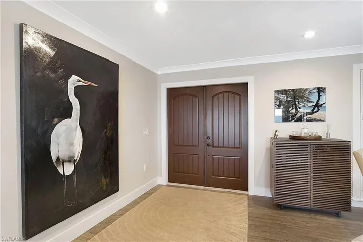 Double door Entry foyer opens to the open great room, kitchen & dining areas! You  will love the Wood-look Tile plank flooring throughout!