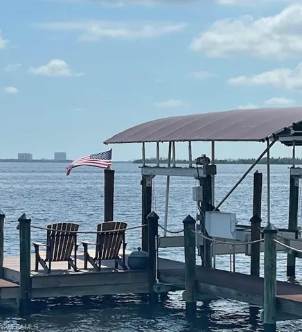 Photo of previous boat canopy. The new canopy will be the same color so that it matches the house and roof.