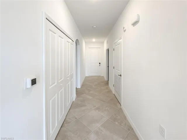 Hall featuring baseboards