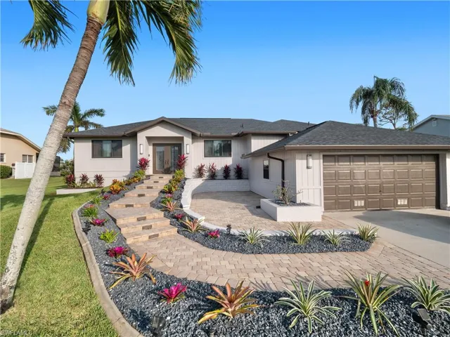 View of front of home featuring a garage