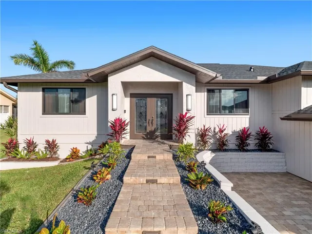 View of front of home featuring french doors