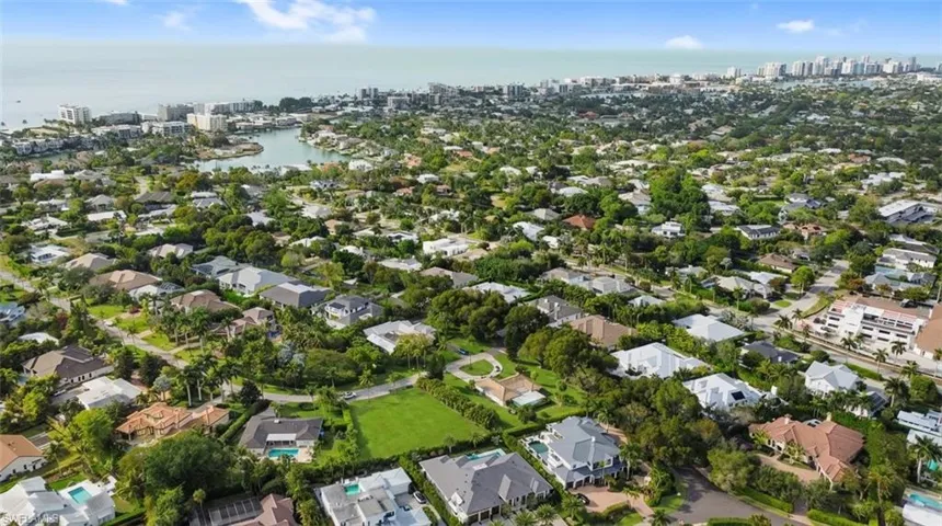 View of urban area featuring a nearby body of water and nearby suburban area