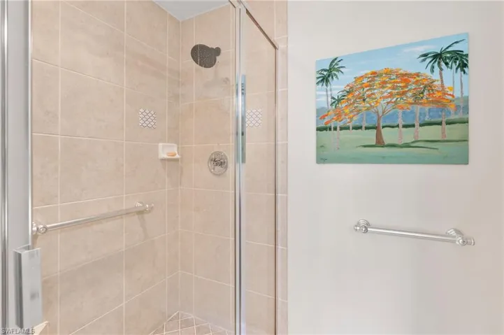 Full bath with a shower stall