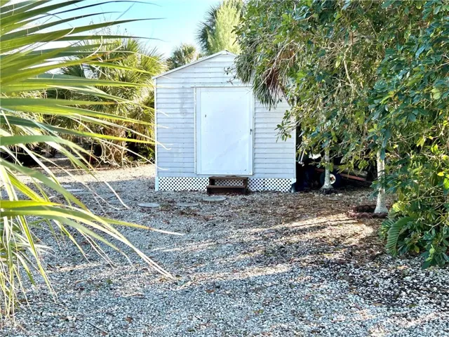 Large storage building with separate driveway access.