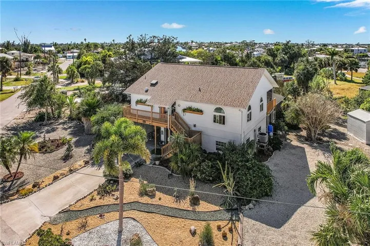 Large, low maintenance lot is the garden spot of the neighborhood