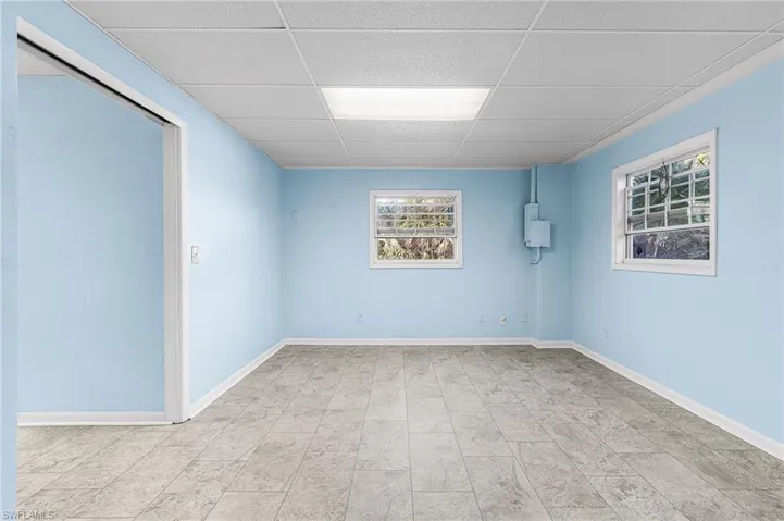 Lower area for recreation, hobbies, storage.