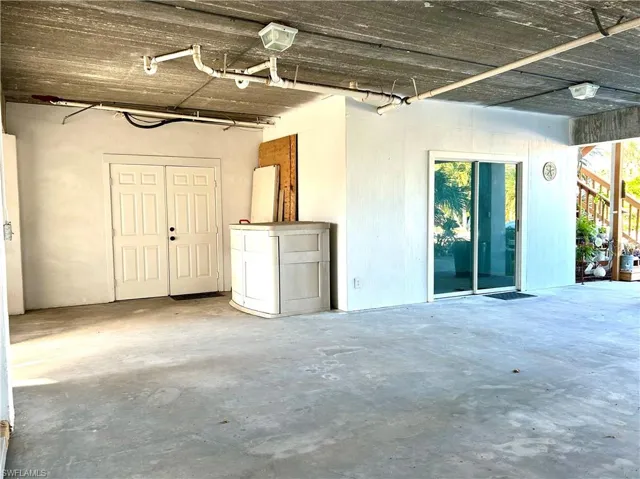 Covered area for storage, garbage, and recycle