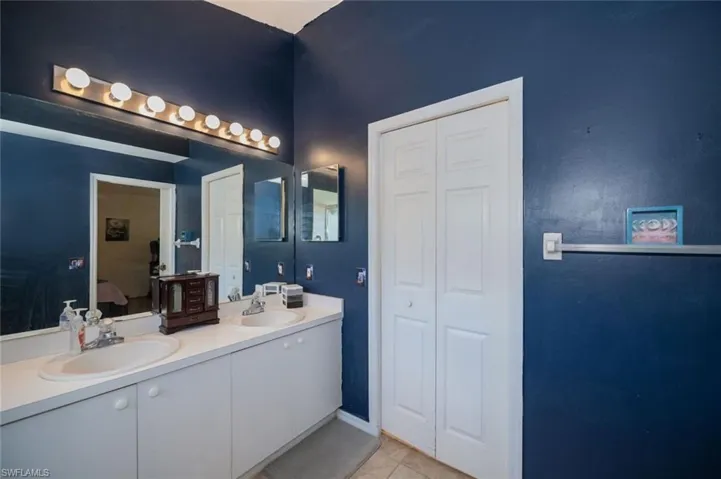 Double sinks and walk-in closet.