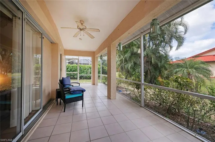Lanai at rear of house. Sliders to Great Room pocket. There are also sliders to the Primary Suite and one of the Extra Bedrooms.
