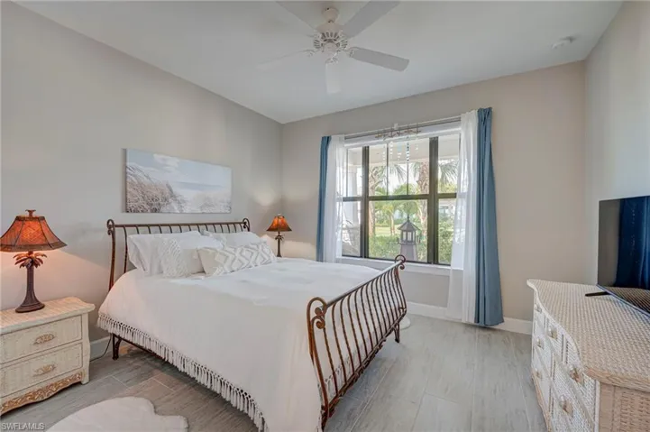 Bedroom featuring light wood-style floors and a ceiling fan