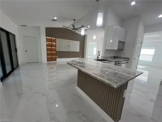 704  Henry  AVE, Lehigh Acres, FL 33972
