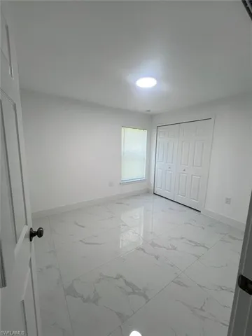 704  Henry  AVE, Lehigh Acres, FL 33972