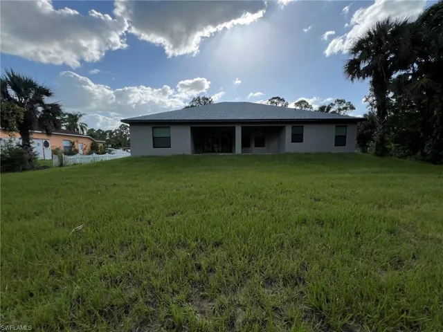 704  Henry  AVE, Lehigh Acres, FL 33972