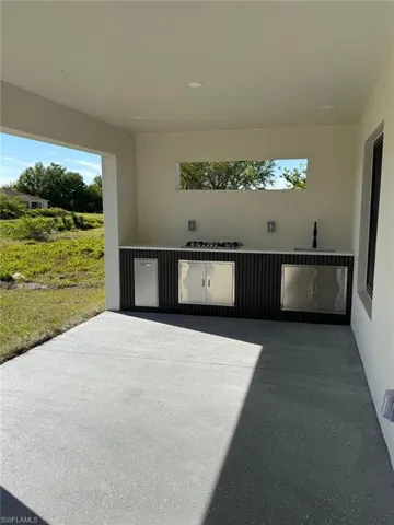 View of patio with area for grilling