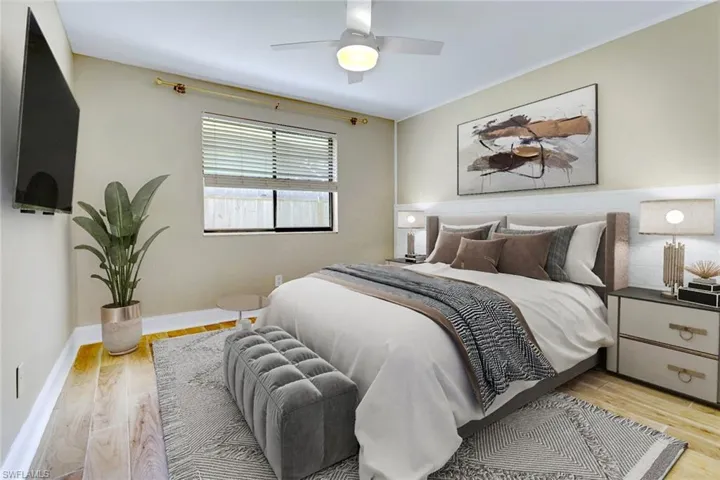 Bedroom with light wood-type flooring and ceiling fan