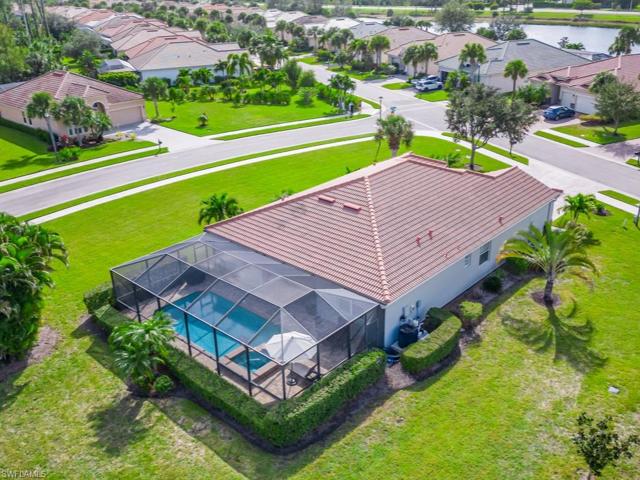 An aerial perspective encapsulates a lifestyle where luxury meets functionality, where the home becomes a private retreat against the backdrop of the highly desired Madison Park subdivision.