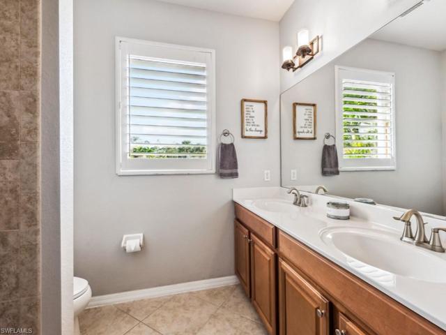 Large Dual Vanity And Tiled Shower.