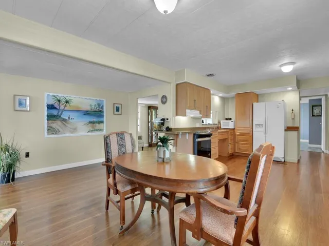 Dining area featuring light hardwood / wood-style floors and sink